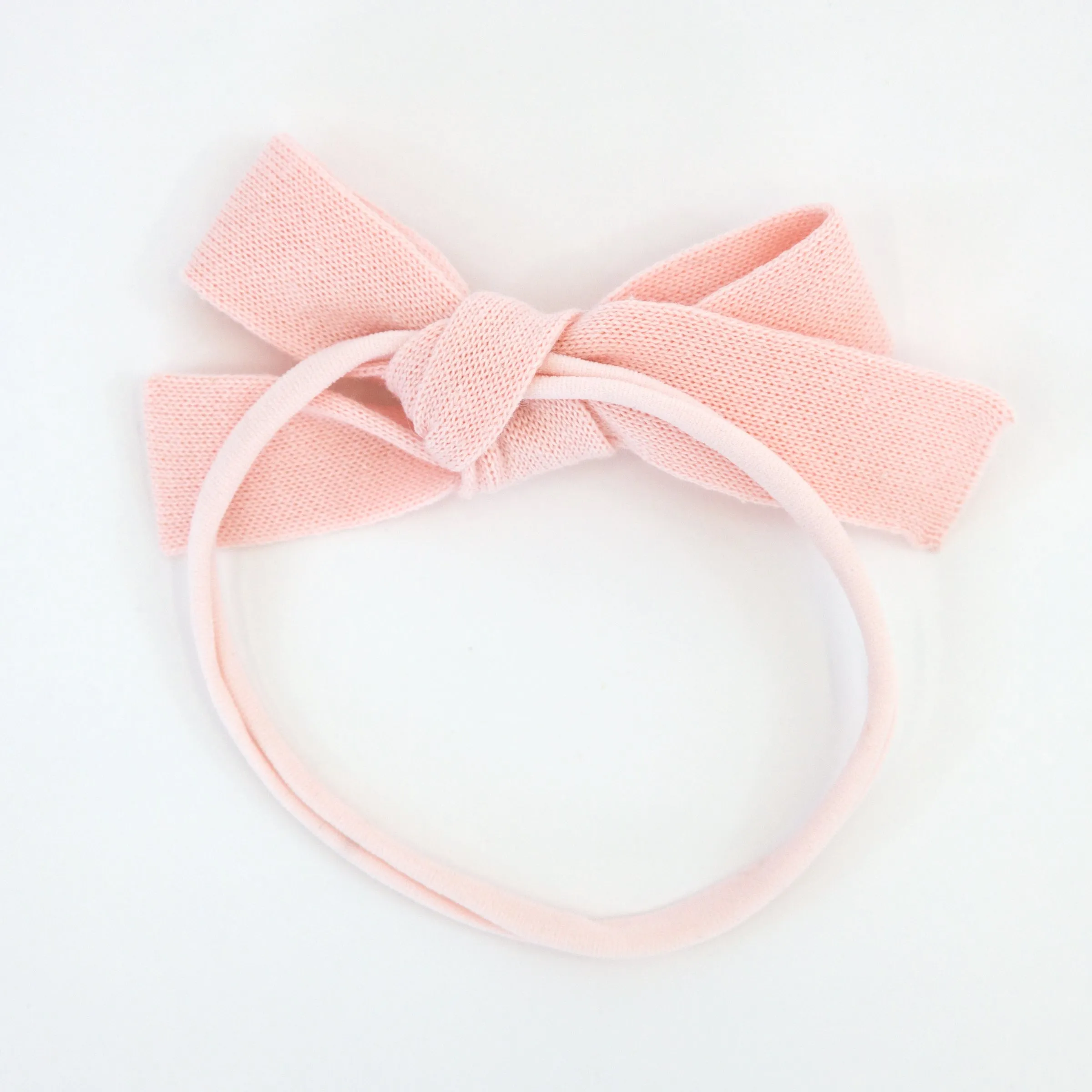 Knitted Bow on Nylon Headband - Pale Pink